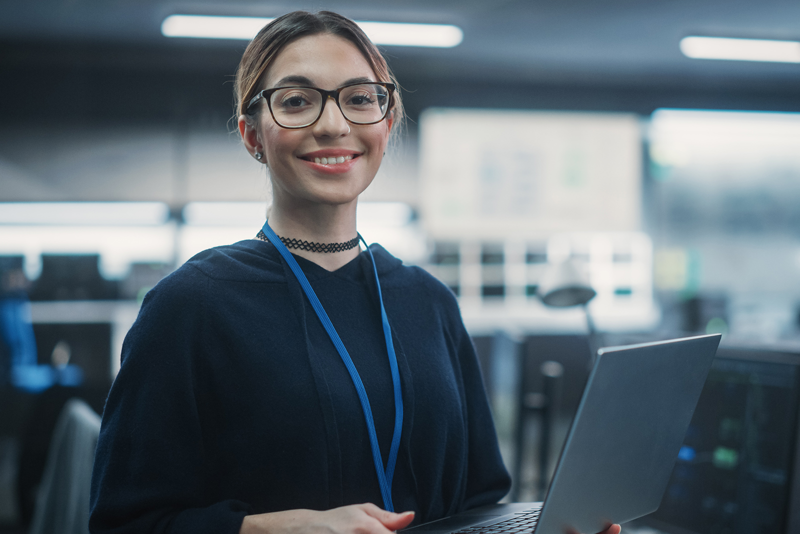 cybersecurity student in a computer classroom setting